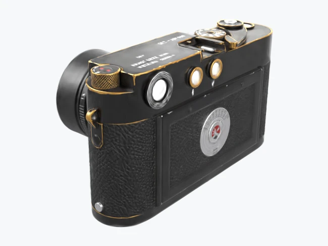 The same camera as a Gaussian splat, from the same viewpoint: nearly identical, slightly softer on the fine engravings